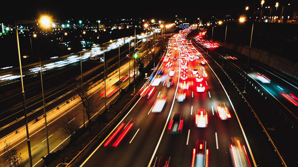 Highway Traffic Cars Driving Time Lapse at Multiple Lane Speedway