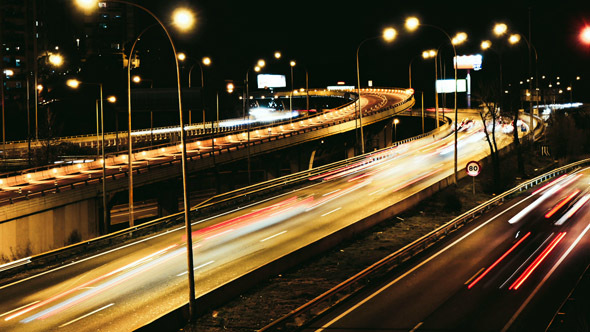 Highway Traffic Cars Driving at Multiple Lane Speedway