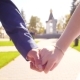 Newly Married Man and Woman Walking in the Park Holding Hands - VideoHive Item for Sale