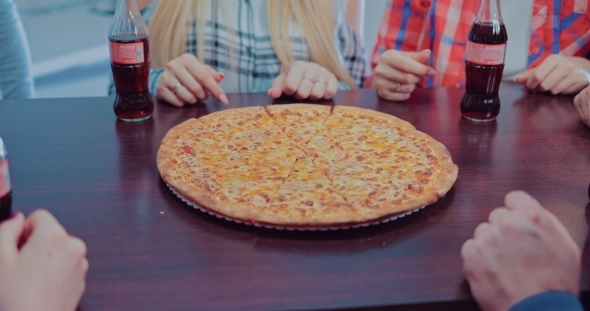 Hungry Friends Taking Pieces of Cheese Pizza