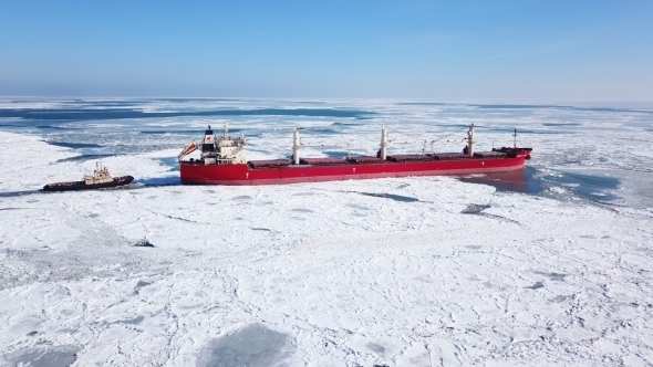 The Ship Sails Through the Sea Ice in the Winter,