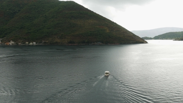 Quick Red White Boat Floating in the Bay