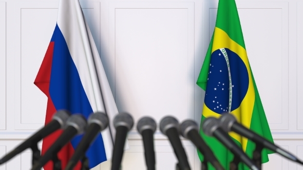 Flags of Russia and Brazil at International Press Conference alt