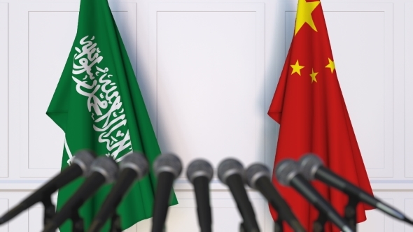 Flags of Saudi Arabia and China at International Press Conference alt