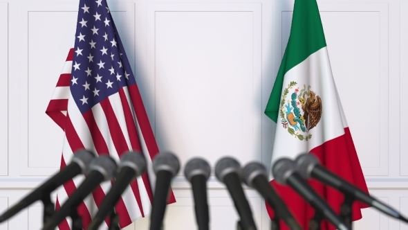 Flags of the USA and Mexico at International Press Conference alt