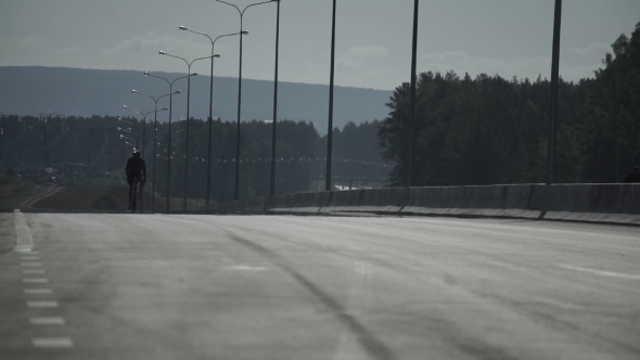 Cyclist on the Road