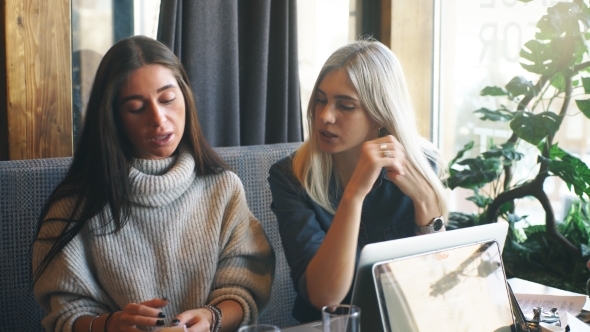 Two Businesswoman Working Together About Documents, Partner Discuss Plan or Idea and Opinion Meeting