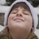 Snowflakes Fall on the Face of a Boy Who Smiles - VideoHive Item for Sale