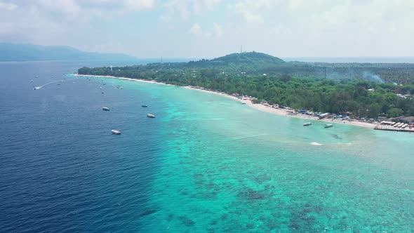 Motion Above Shelf Zone of Beautiful Island with Sand Beach