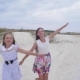 Girls Teenagers Run along Road Spreading Their Arms Like Wings - VideoHive Item for Sale