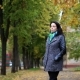 Happy Woman Enjoying Nature. Standing in Autumn Park.  - VideoHive Item for Sale