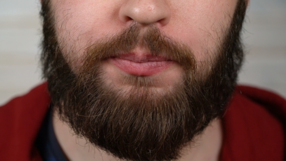 Bearded Man Eating Pizza