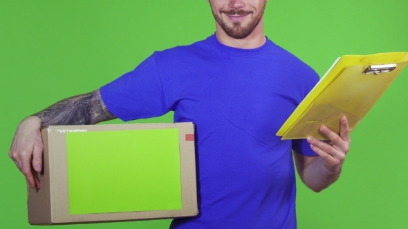 Deliveryman Holding Copyspace Cardboard Box and Clipboard