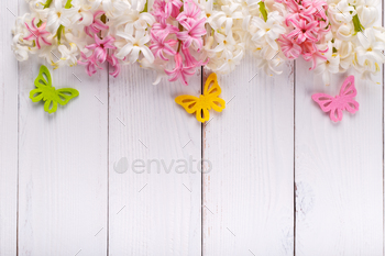 nth flowers on white wooden board with copy space