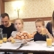 a Happy Family Having Breakfast in Hotel Room - VideoHive Item for Sale