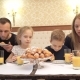 a Happy Family Having Breakfast in Hotel Room - VideoHive Item for Sale