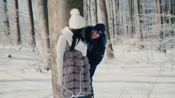 Couple in the Winter Forest