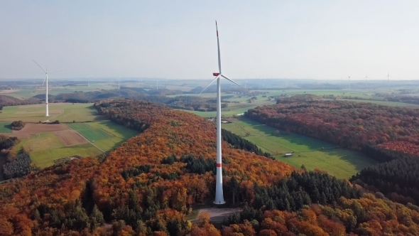 Aerial View of Wind Turbines in Autumn Hillside
