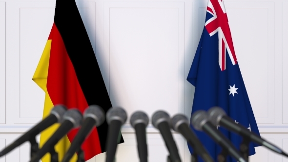 Flags of Germany and Australia at International Press Conference alt