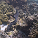 Giant Moray Eel Swims Between Coral Covered Rocks with a Small Cleaner Wrasse - VideoHive Item for Sale