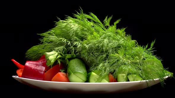 Mixed vegetables on a plate. top view. isolated on white