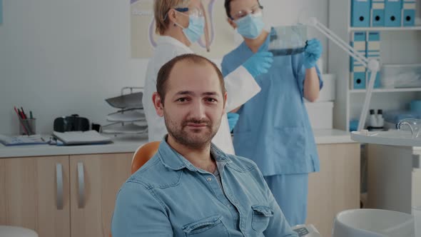 Portrait of Oral Care Patient Smiling and Looking at Camera
