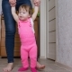 Mother Teaches to Walk Baby in Children's Room - VideoHive Item for Sale