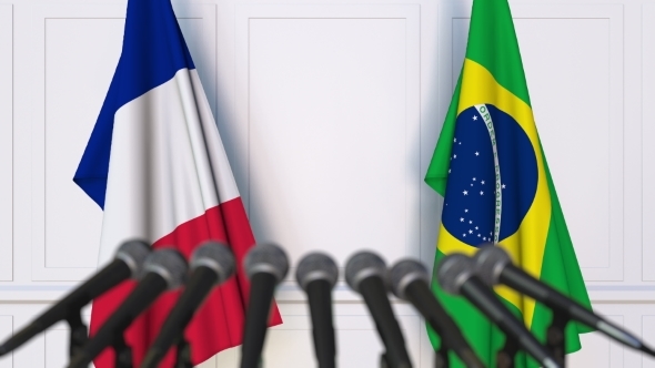 Flags of France and Brazil at International Press Conference alt