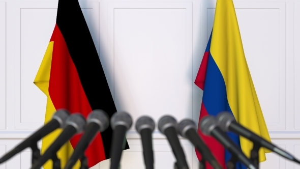 Flags of Germany and Colombia at International Press Conference alt