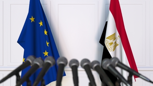 Flags of the European Union and Egypt at International Press Conference alt