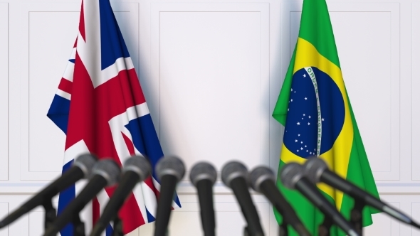 Flags of the United Kingdom and Brazil at International Press Conference alt