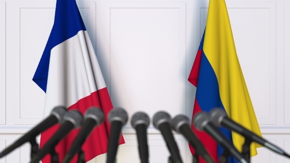 Flags of France and Colombia at International Press Conference alt