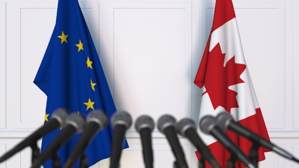 Flags of the European Union and Canada at International Press Conference alt