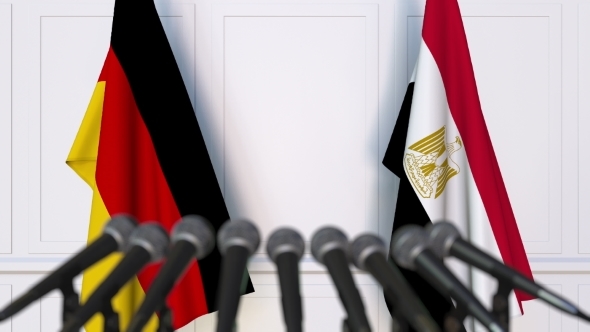 Flags of Germany and Egypt at International Press Conference alt