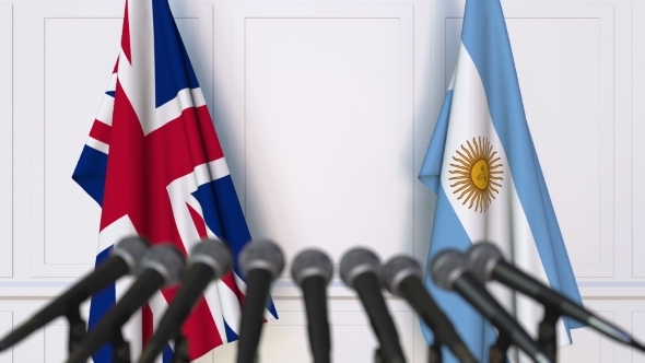 Flags of the United Kingdom and Argentina at International Press Conference alt