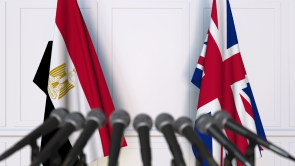 Flags of Egypt and The United Kingdom at International Press Conference alt