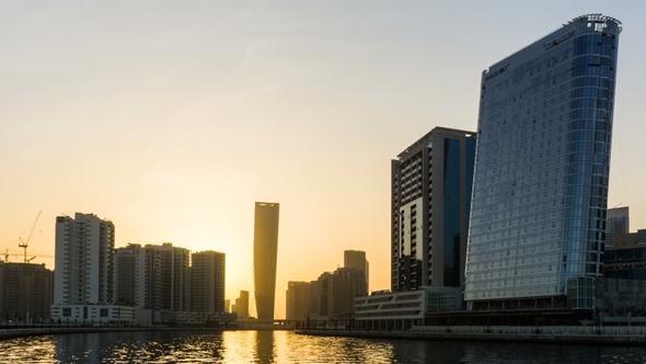 Sunset Over Dubai Creek and Skyscrapers in Business Bay, Dubai, UAE