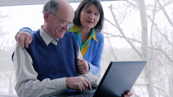 Elderly Family Online Shopping with Laptop Spend Time on Internet on Holiday at Home