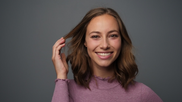 Young Woman Shaking Hair