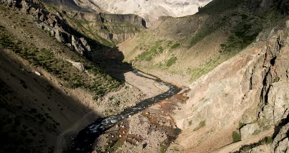 Aerial view of the campanario river with the homonymous hot springs with the sunlight at dawn in the