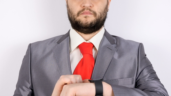 Bearded Businessman Checking His Smartwatch