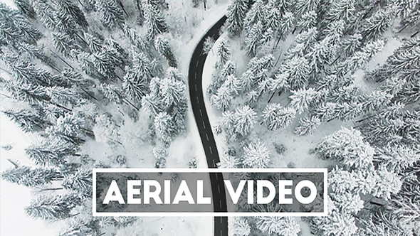 Aerial Video of a Snowy Winter Road in Switzerland
