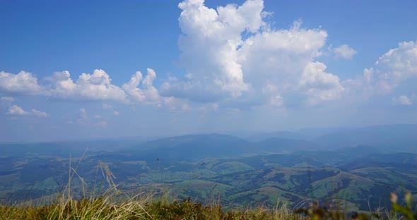 Moving Clouds in the Mountains. Bewitching Picture