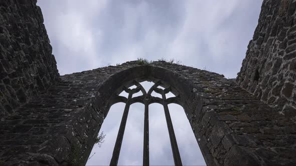 Motion time lapse of Creevelea Abbey medieval ruin in county Leitrim in Ireland as a historical sigh