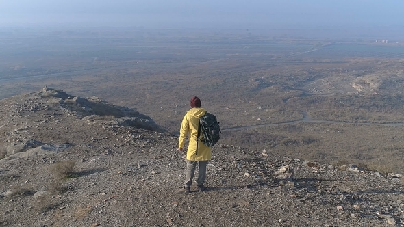 One Man Walking on the Fog Mountain