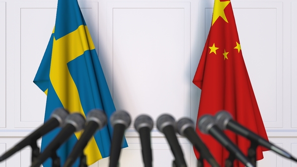 Flags of Sweden and China at International Press Conference alt