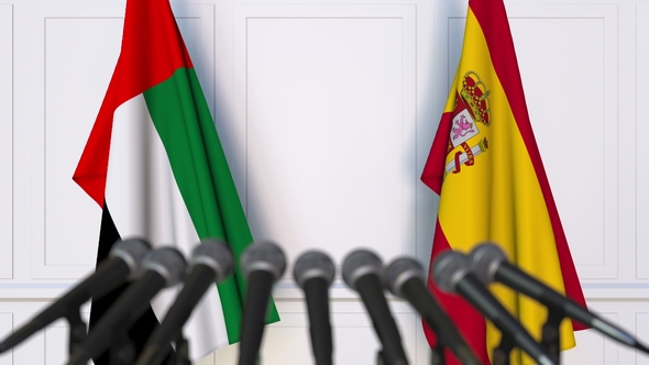 Flags of the UAE and Spain at International Press Conference alt