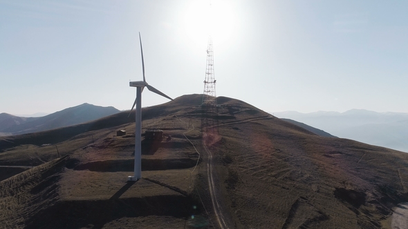 Wind Turbine Generating Electricity on Blue Sky