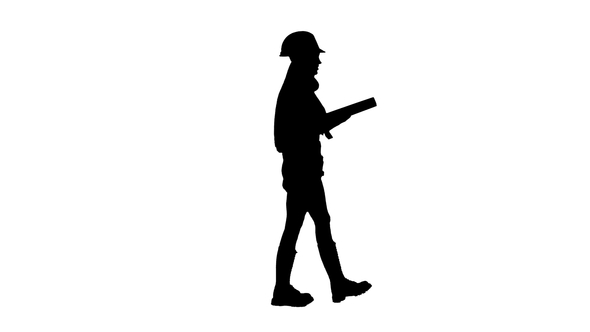 Engeneer Girl in the Helmet with Construction Tools on the Waist Goes. Silhouette