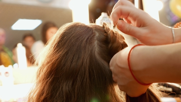 Female Model Getting Her Hair Dressed